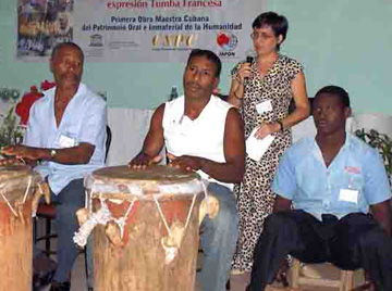 Tumba Francesa musicians playing the <i>tambores</i> and <i>catá</i>