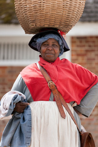 An actor-interpreter portrays Edith Cumbo